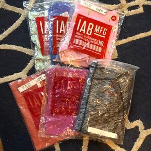 3 XL IAB MFG shorts, 2 L shirts, 1 L jacket